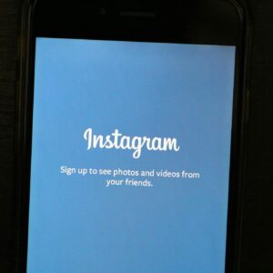 Turned-on Phone Displaying Instagram Application